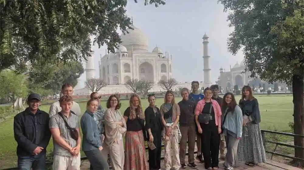 Tour guests visiting the Taj Mahal during a same day tour from Delhi
